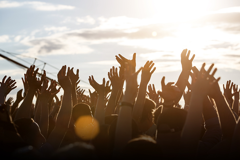 A group of people partying at a summer festival