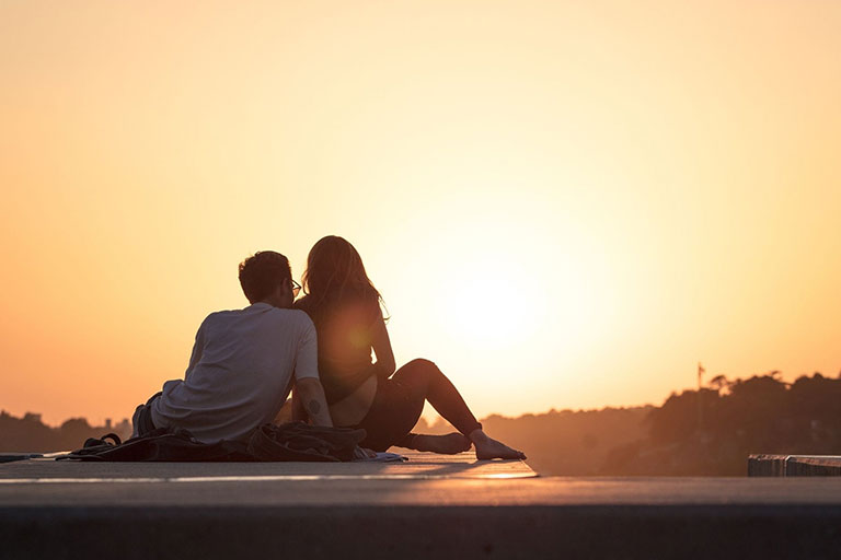 A couple watching the sunset 