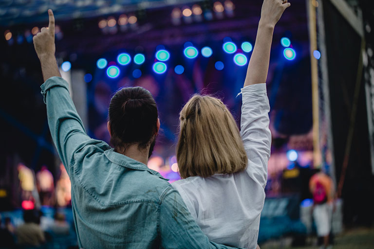 A couple at a music festival