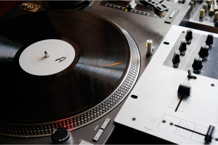 a close up of a record player spinning a vinyl