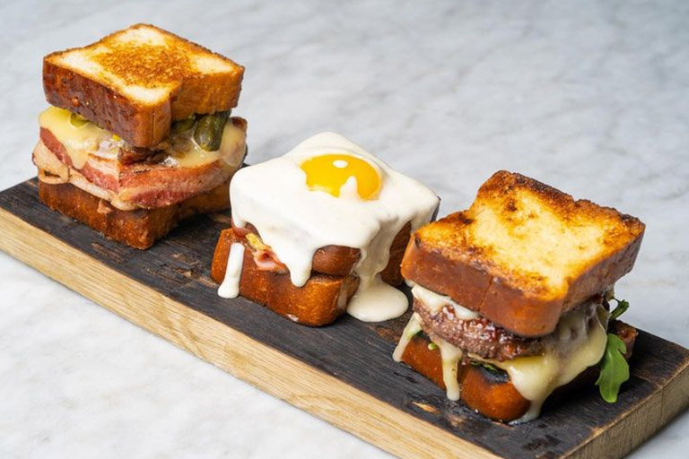 Smoked Salmon Tartine, Petit Croque Madam, and Heritage P TÉ Melt from Bardot Brasserie