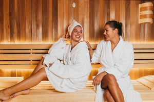  two women in a sauna at a hotel spa in Vegas 