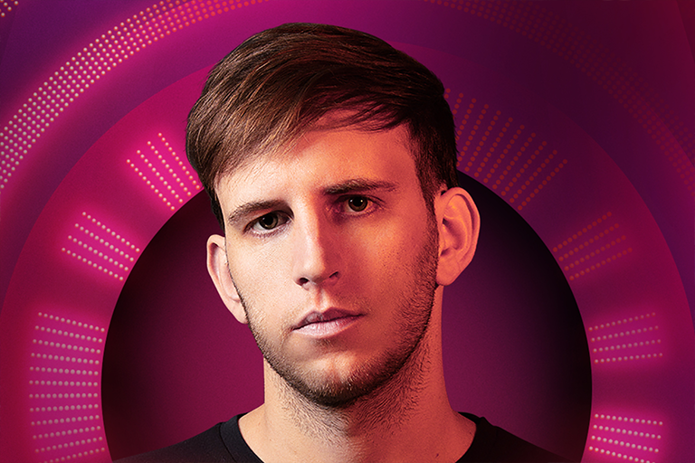  A headshot of Illenium in front of a dark pink background 