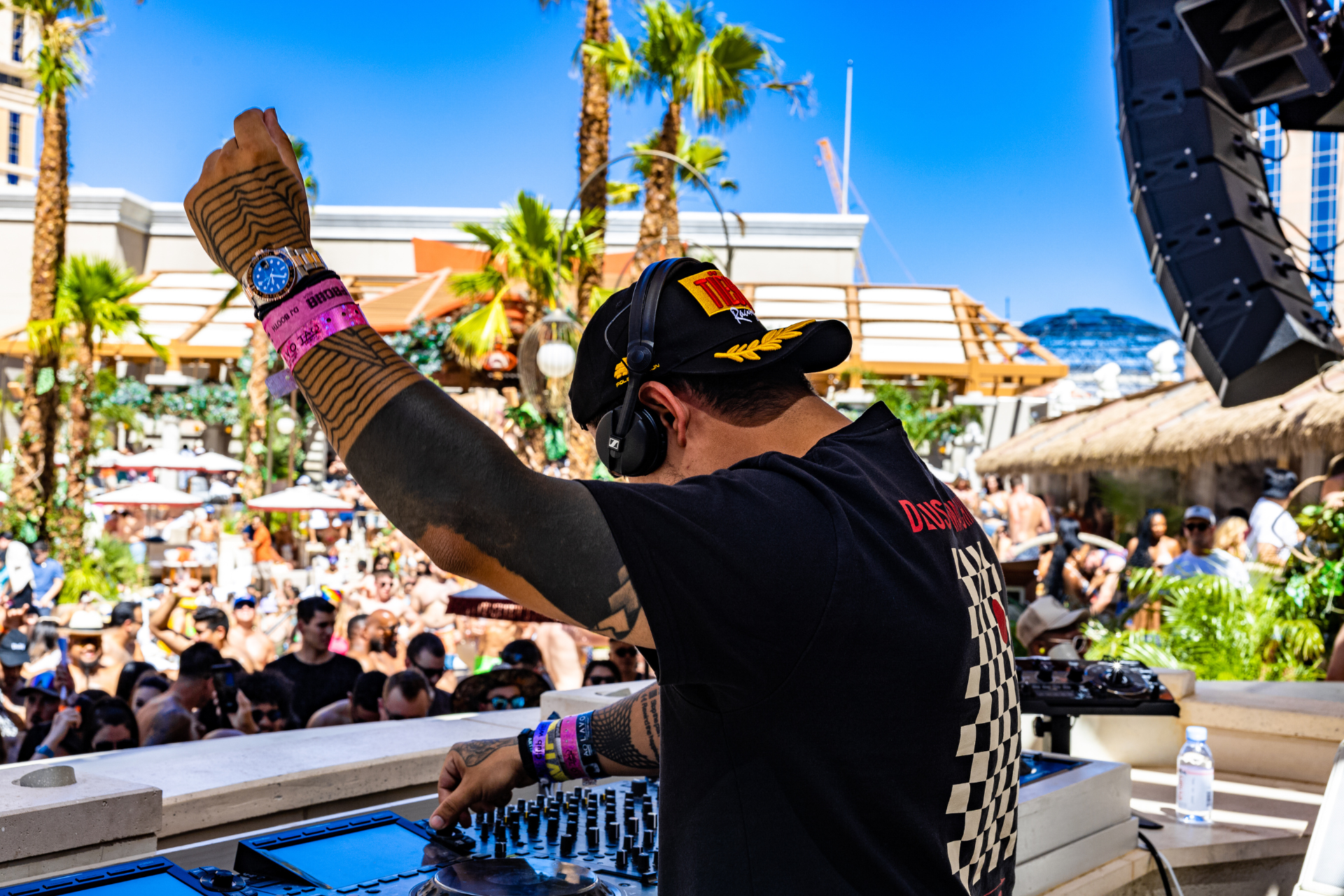 An electronic music producer making music for a crowd at Exodus Festival